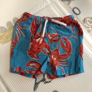 Baby Boden swim trunks